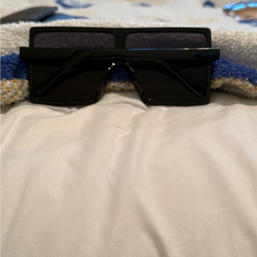 Back “windshield wipers” sunglasses 
Worn once!